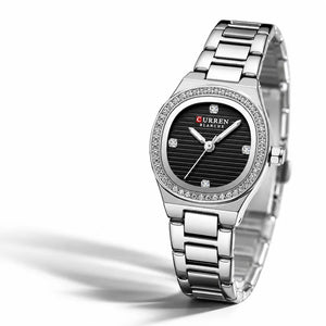 Montre femme argentée Minoran 9101 à cadran noir vue de trois quarts