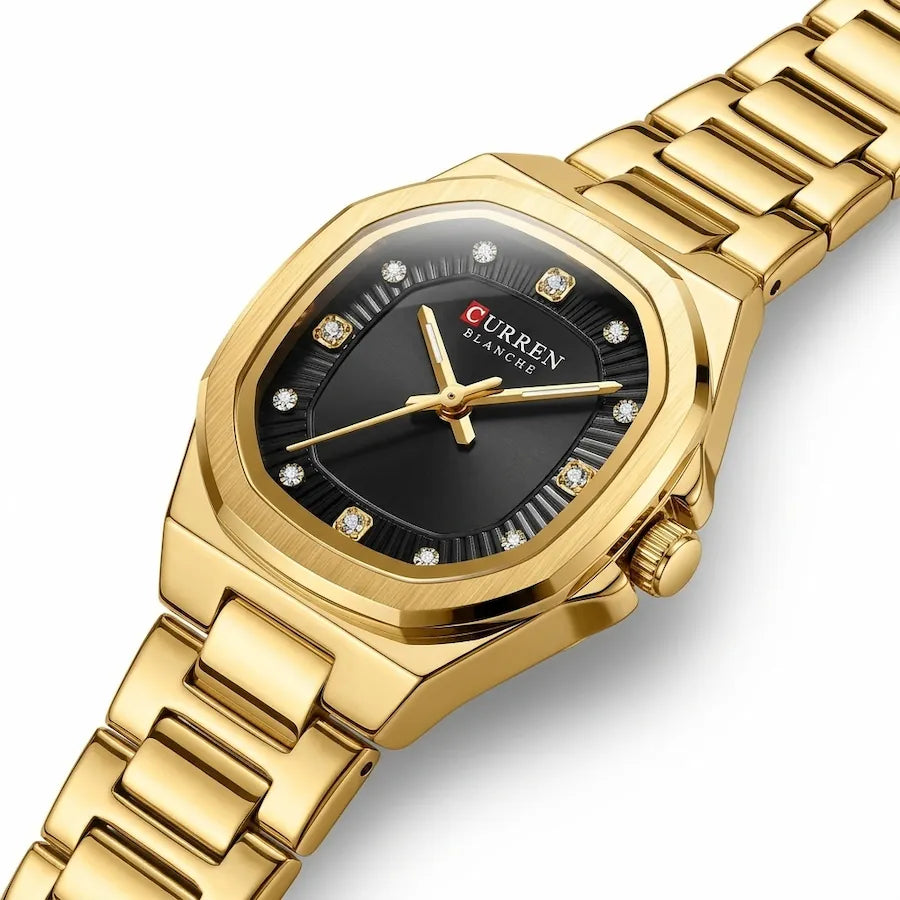Montre femme dorée à cadran noir Minoran 9101, vue en diagonale du cadran et du bracelet
