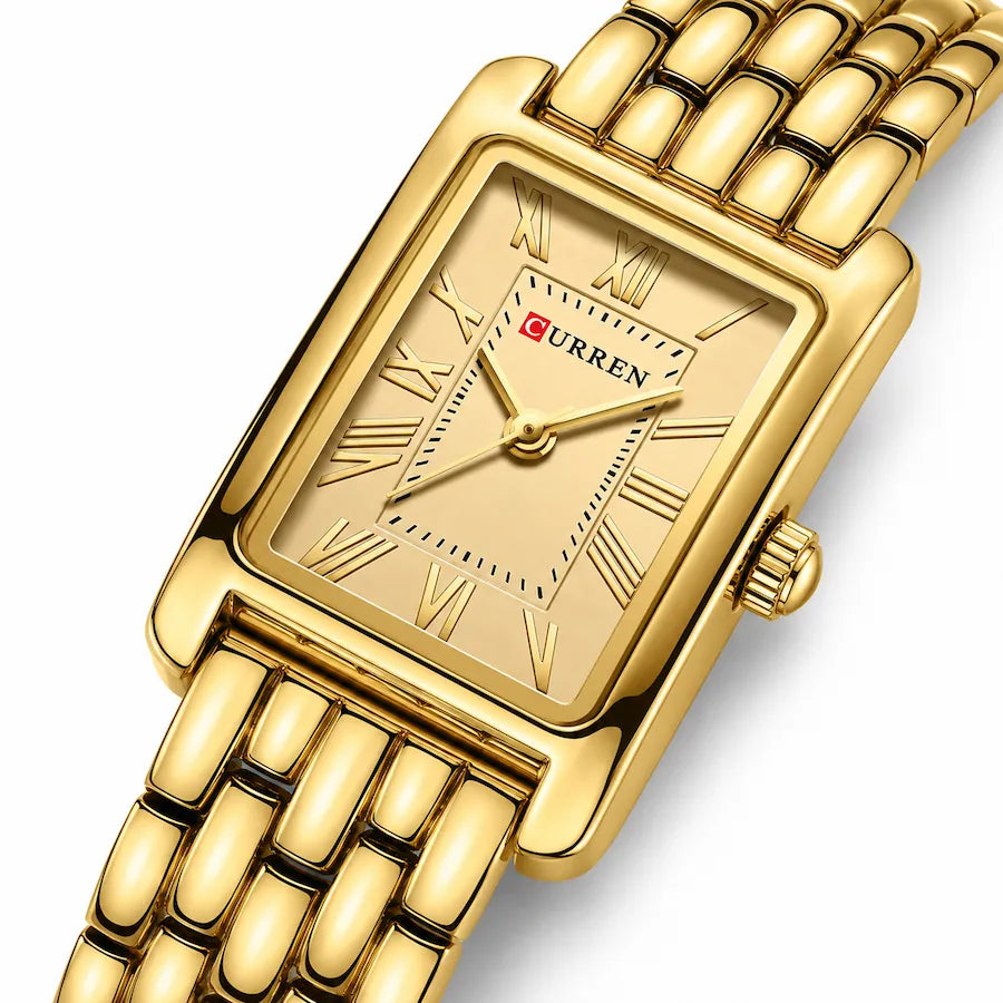 Montre Minoran 9115 dorée à cadran doré en zoom diagonal avec chiffres romains et rangées de maillons arrondis