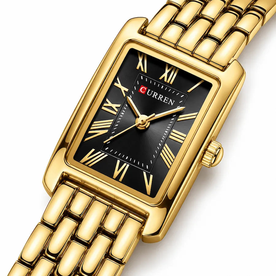 Montre Minoran 9115 dorée à cadran noir en zoom diagonal avec chiffres romains et rangées de maillons arrondis