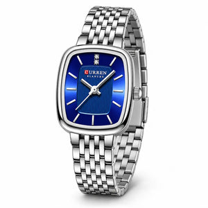 Montre femme argentée Minoran 9093 avec cadran bleu rectangulaire, vue de face