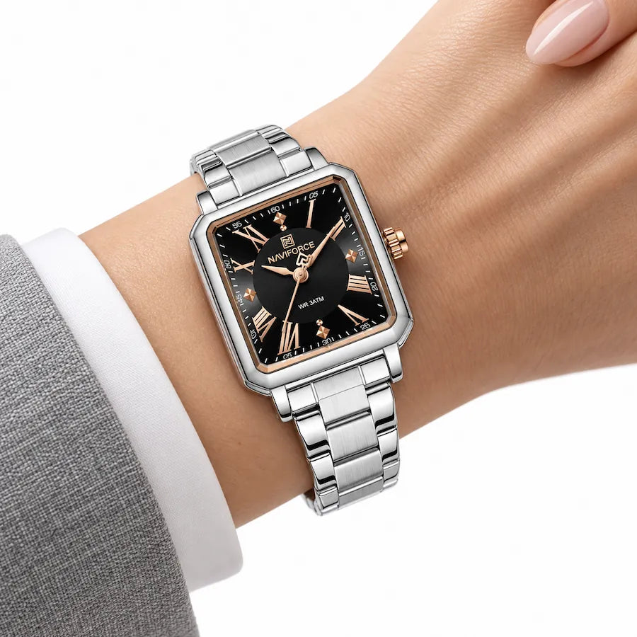 Montre femme argentée Minoran NF5065 portée avec une tenue élégante