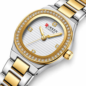 Minoran 9101 gold and silver two-tone round women's watch, close-up view