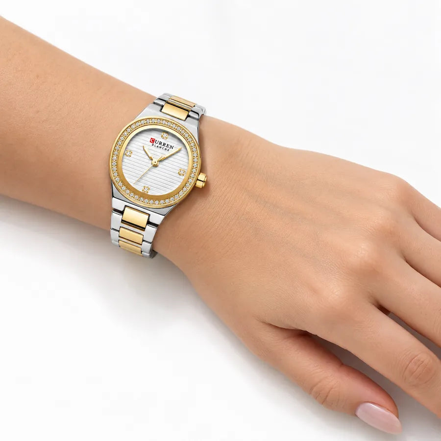 Minoran 9101 gold and silver two-tone women's watch, worn on the wrist
