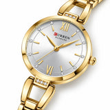 Montre femme dorée Minoran 9092 à cadran clair, vue diagonale