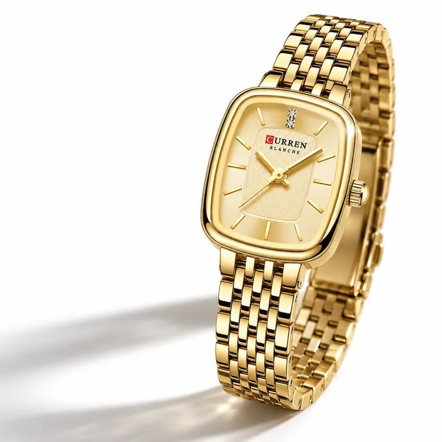 Montre femme dorée Minoran 9093 à cadran doré dans une mise en scène minimaliste sur fond blanc