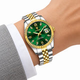 Montre femme dorée à cadran vert Minoran GoldenStar Lady, portée au poignet avec un blazer