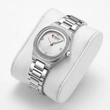 Montre Minoran 9101 à cadran argenté et bracelet en acier inoxydable sur coussin blanc