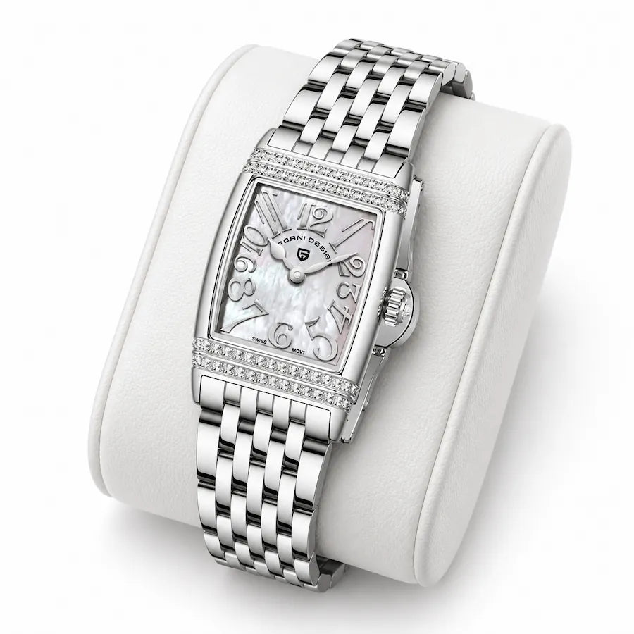 Montre Minoran PD-1737 argentée à cadran blanc posée sur un coussin blanc