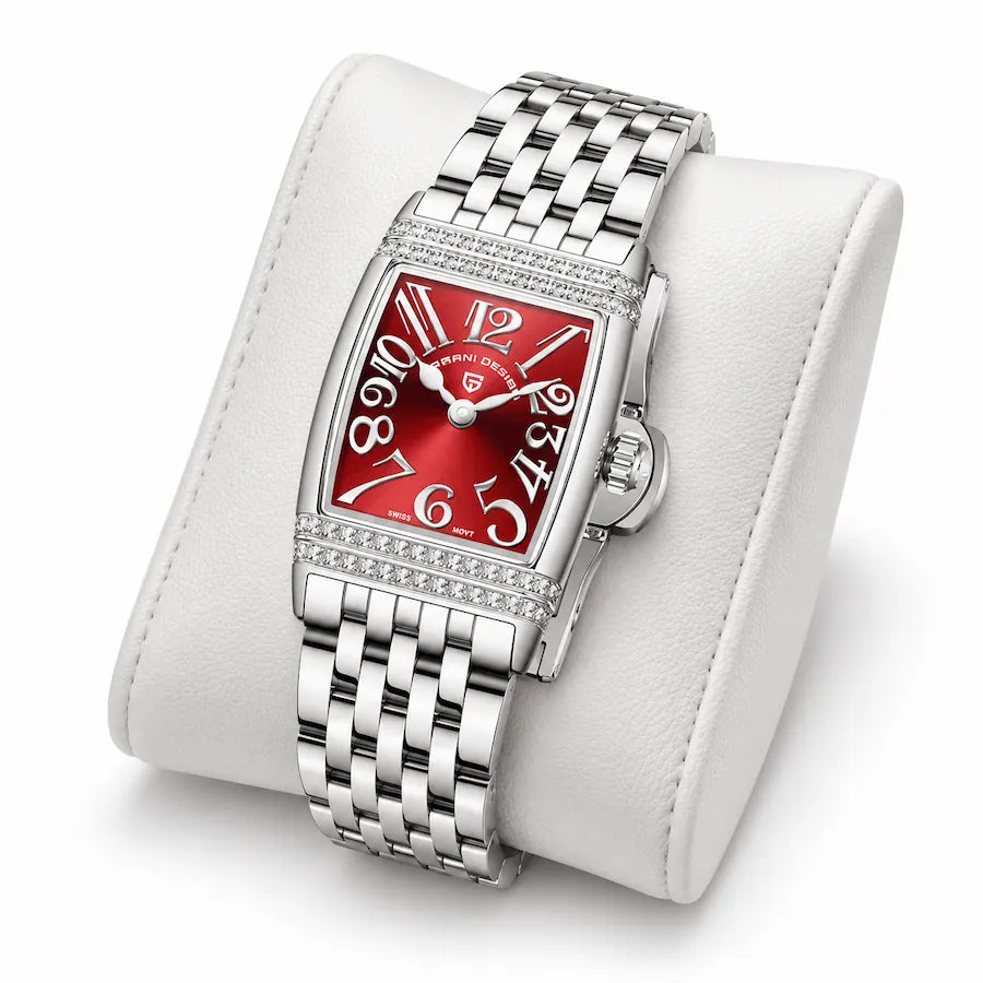 Montre Minoran PD-1737 argentée à cadran rouge posée sur un coussin blanc