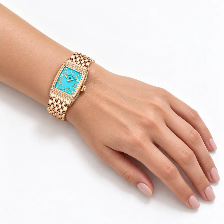 Montre Minoran PD-1737 dorée à cadran bleu portée au poignet