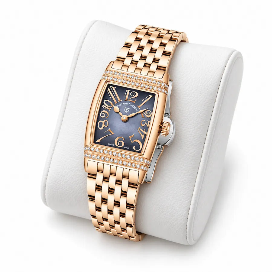 Montre Minoran PD-1737 dorée à cadran gris posée sur un coussin blanc