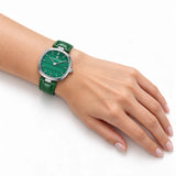 Montre Minoran PD-1825 verte en cuir portée au poignet