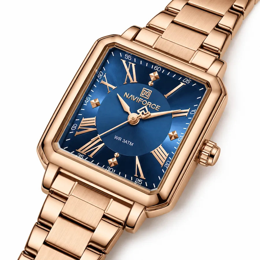 Montre Minoran NF5065 couleur or rose à cadran bleu en zoom diagonal, avec chiffres romains et index brillants