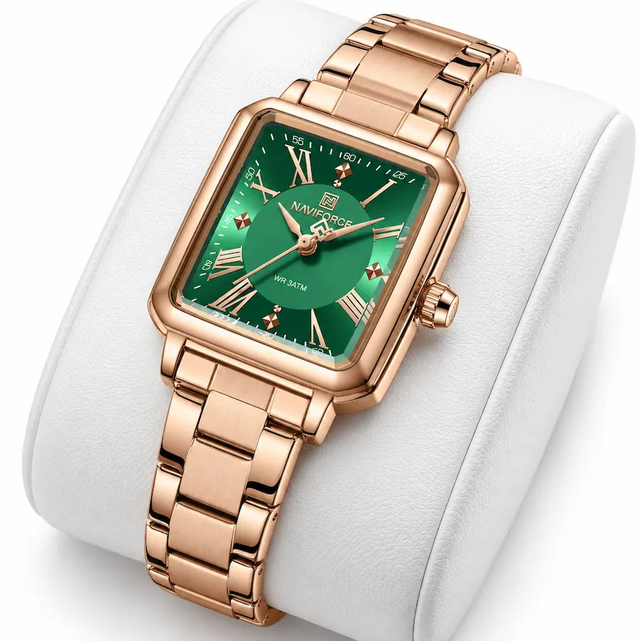 Montre femme Minoran NF5065 couleur or rose présentée sur un coussin blanc