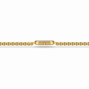 Vue latérale de la montre Minoran 9093 avec son bracelet doré ouvert sur un fond blanc