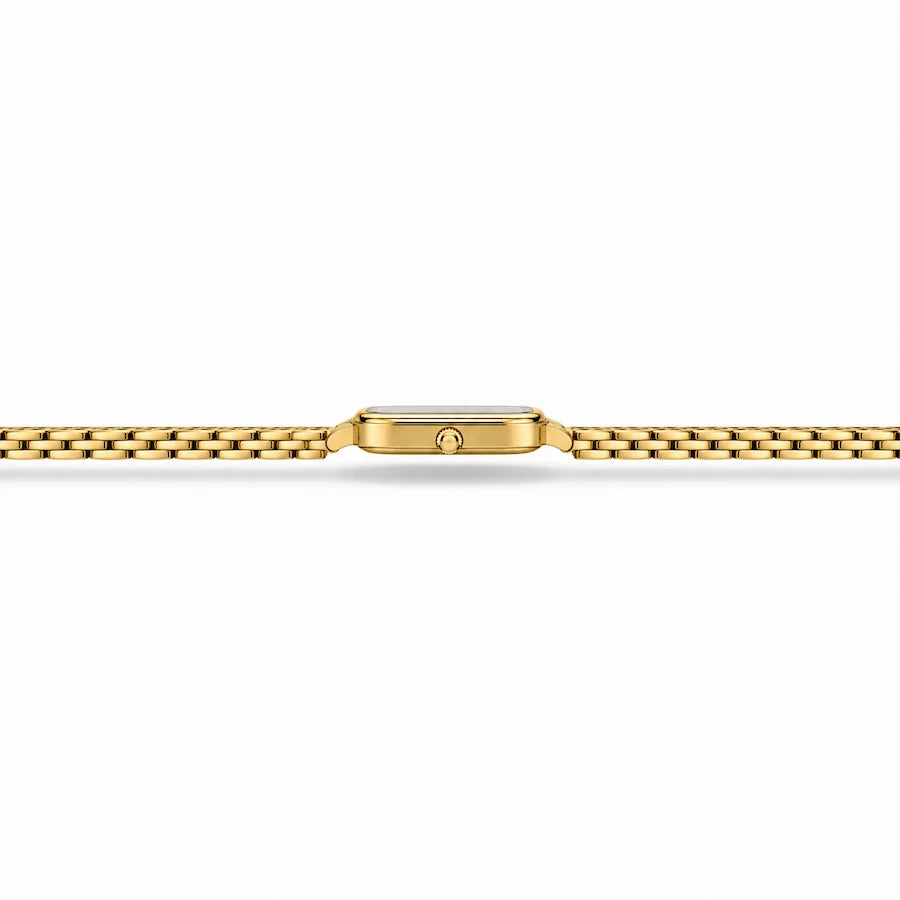 Vue latérale de la montre Minoran 9093 avec son bracelet doré ouvert sur un fond blanc