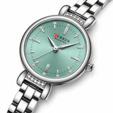 Montre ronde femme Minoran 9098, bracelet argenté et cadran vert menthe en vue trois-quarts