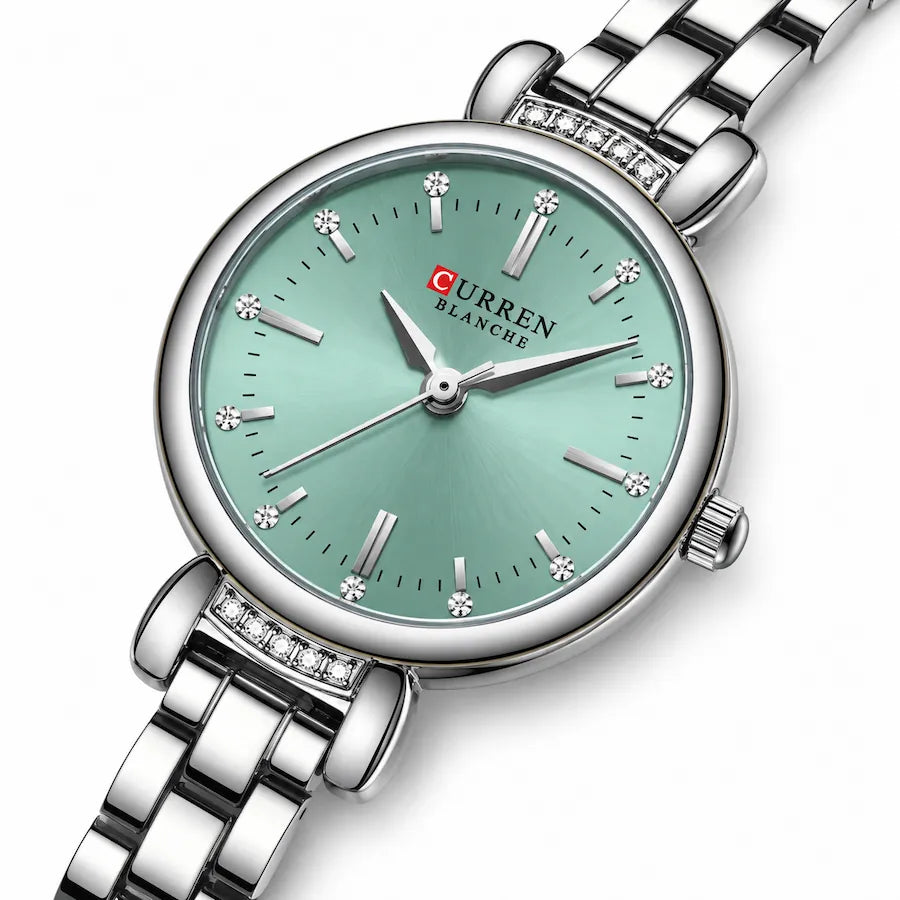Montre ronde femme Minoran 9098, bracelet argenté et cadran vert menthe en vue trois-quarts